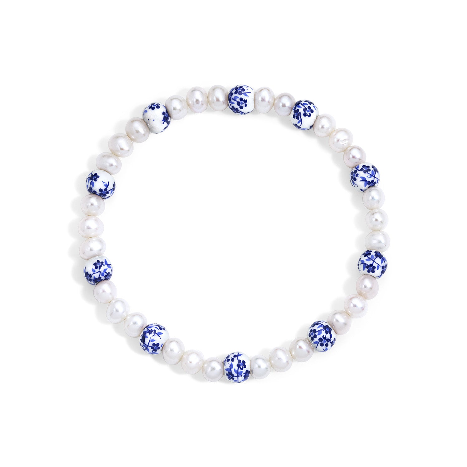 Pearl bracelet with blue and white ceramic beads on a white background