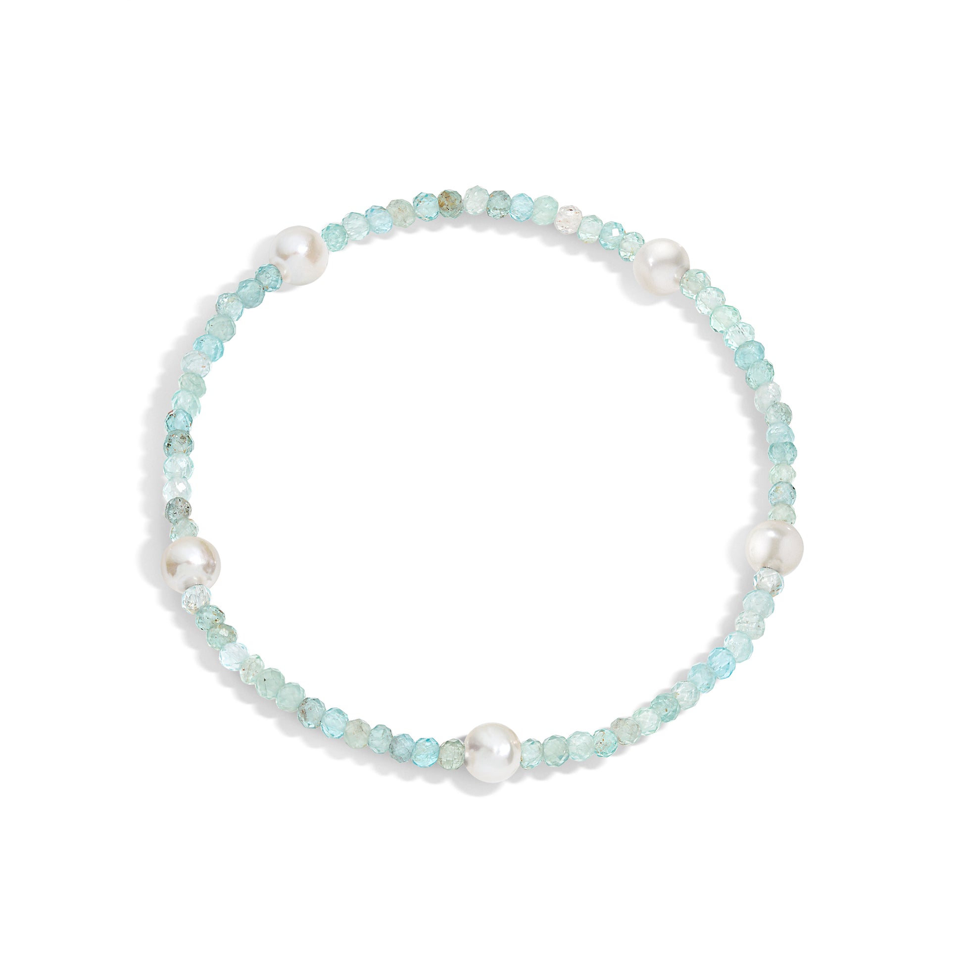 A bracelet with aquamarine gemstones and white pearls, displayed on a white background.