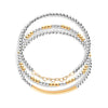 A set of three silver-colored bracelets designed for layering, featuring different styles including a gold bar accent, beaded chain, and a stretch bracelet.