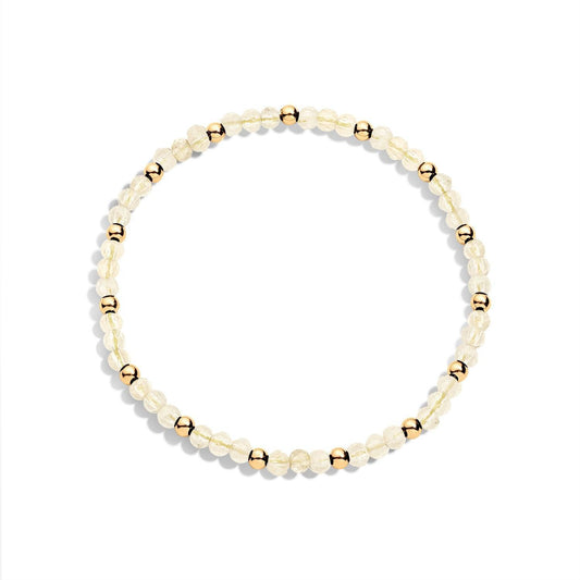A bracelet with Citrine gemstones and gold-filled beads, displayed against a white background.