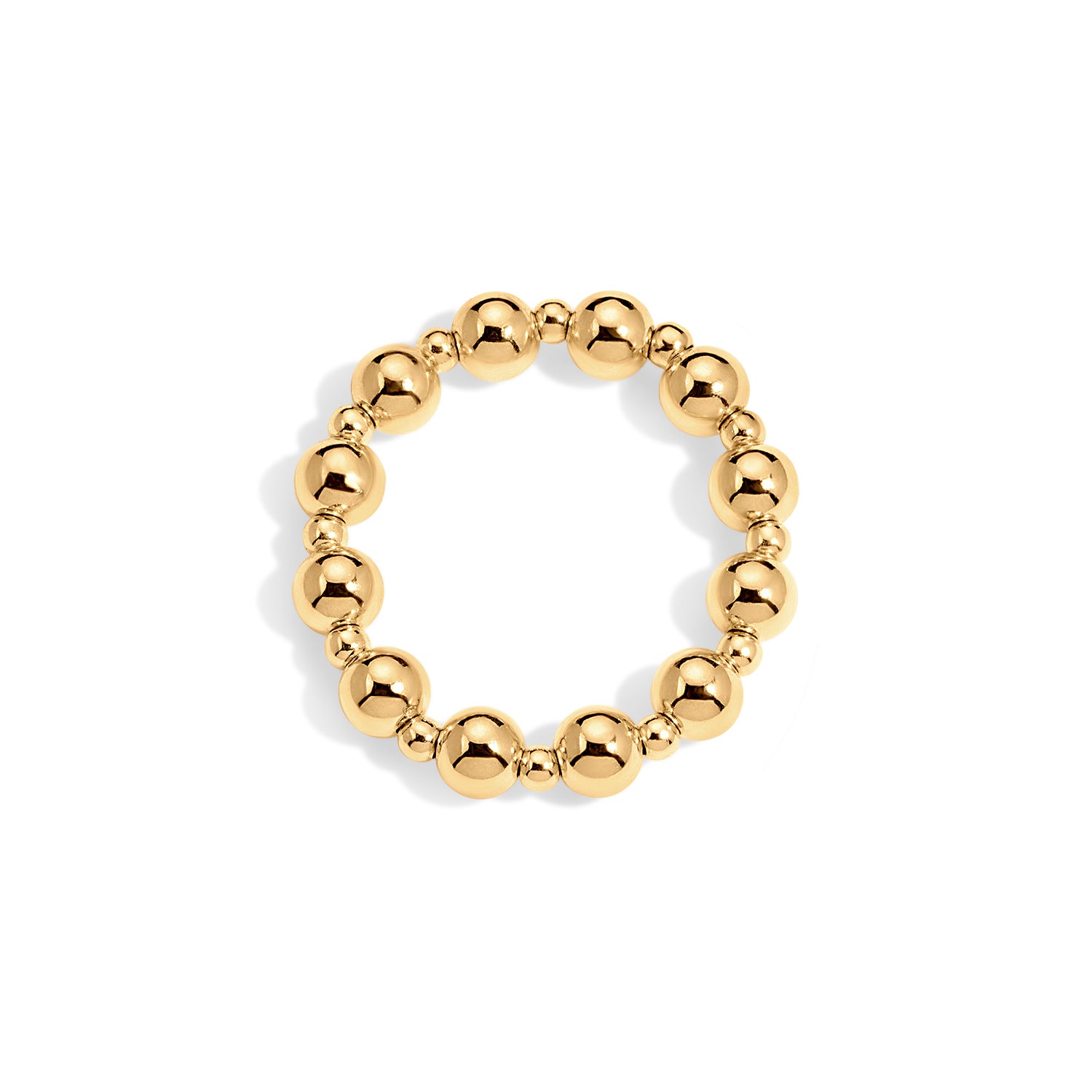 Gold beaded ring on a white background