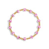 Bracelet with pink beads and gold accents on a white background