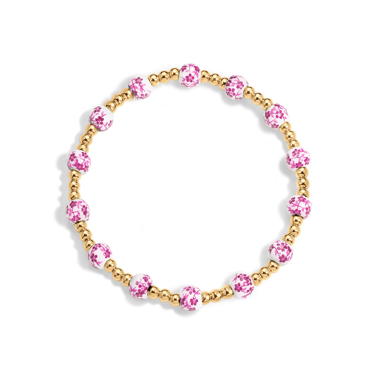 Bracelet with pink beads and gold accents on a white background