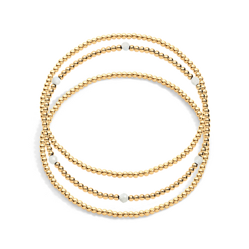 3 gold filled beaded bracelets with one having moonstone gemstones