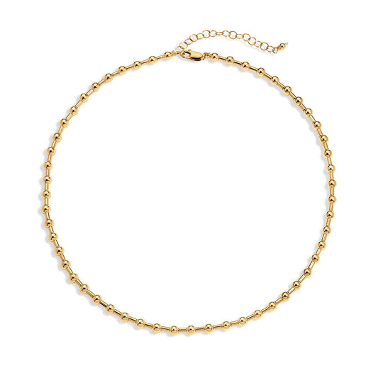 Gold chain necklace on a white background