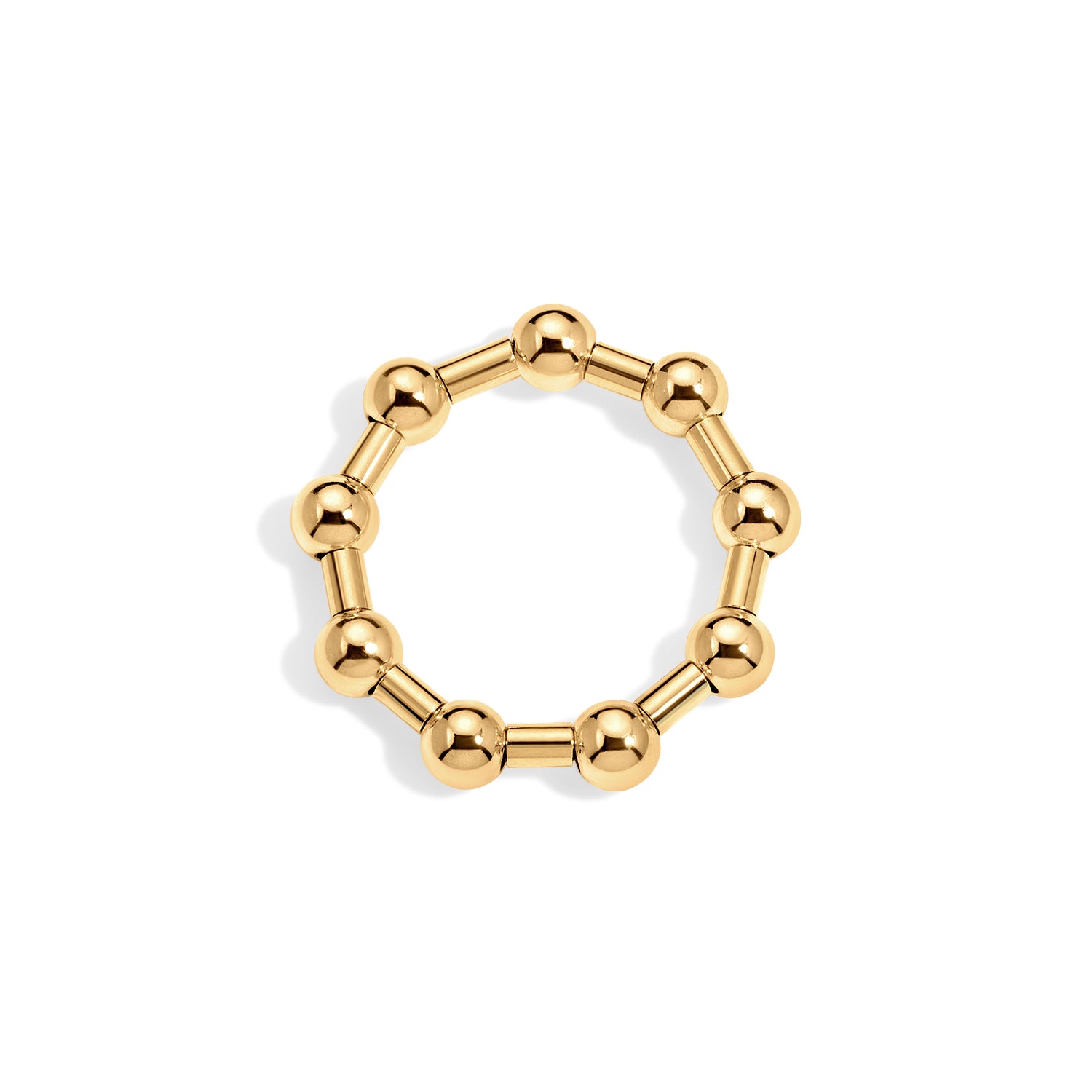 Gold beaded ring on a white background