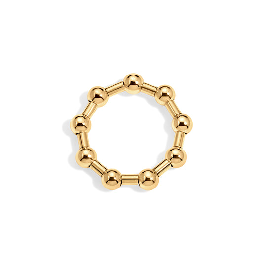 Gold beaded ring on a white background