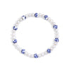 Pearl bracelet with blue and white ceramic beads on a white background