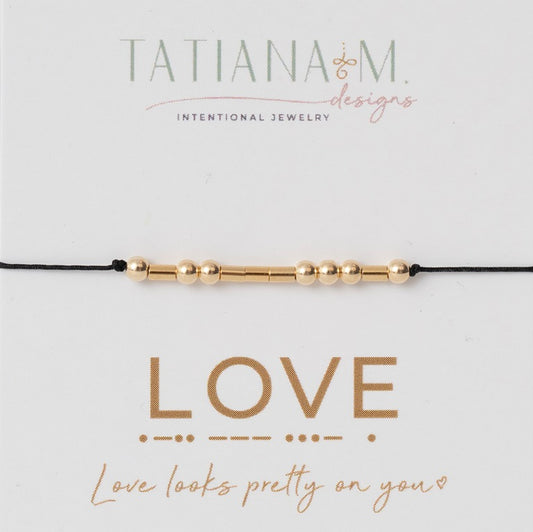 Black string bracelet with gold filled beads on LOVE card