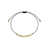Black string bracelet with gold filled beads