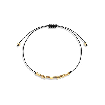 Black string bracelet with gold filled beads