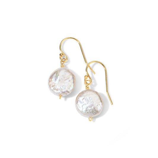 A pair of gold-tone fishhook drop earrings with irregular, lustrous white baroque pearls, shown on a clean white background.