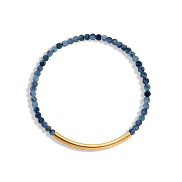 A blue gemstone bracelet with a 14k gold-filled paperclip accent