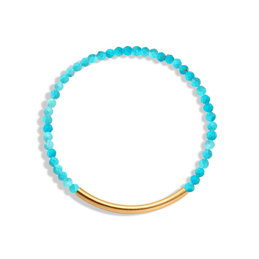 A turquoise gemstone bracelet with a 14k gold-filled paperclip accent