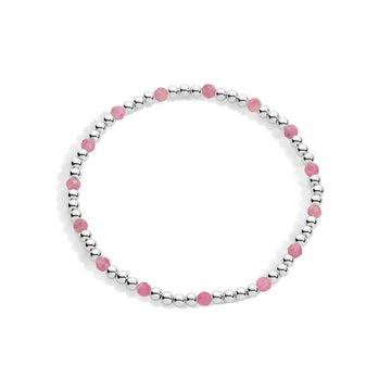 A sterling silver bracelet with pink gemstones, featuring a stretch design for flexibility.