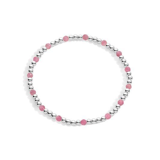 A sterling silver bracelet with pink gemstones, featuring a stretch design for flexibility.