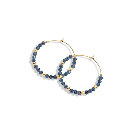 A pair of gold-filled hoop earrings with blue gemstones and gold beads
