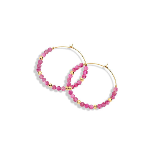 A pair of gold-filled hoop earrings with pink gemstones and gold beads