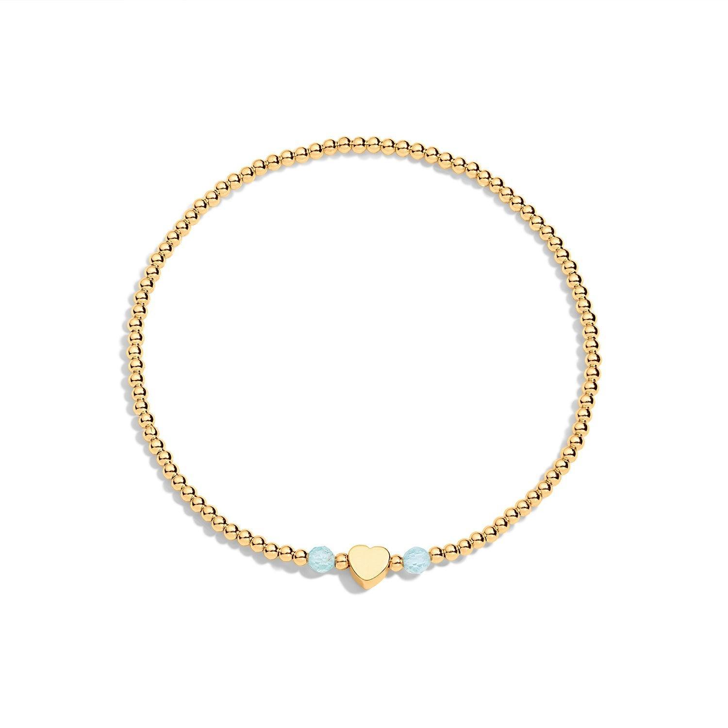 Gold filled bracelet with aquamarine gemstone