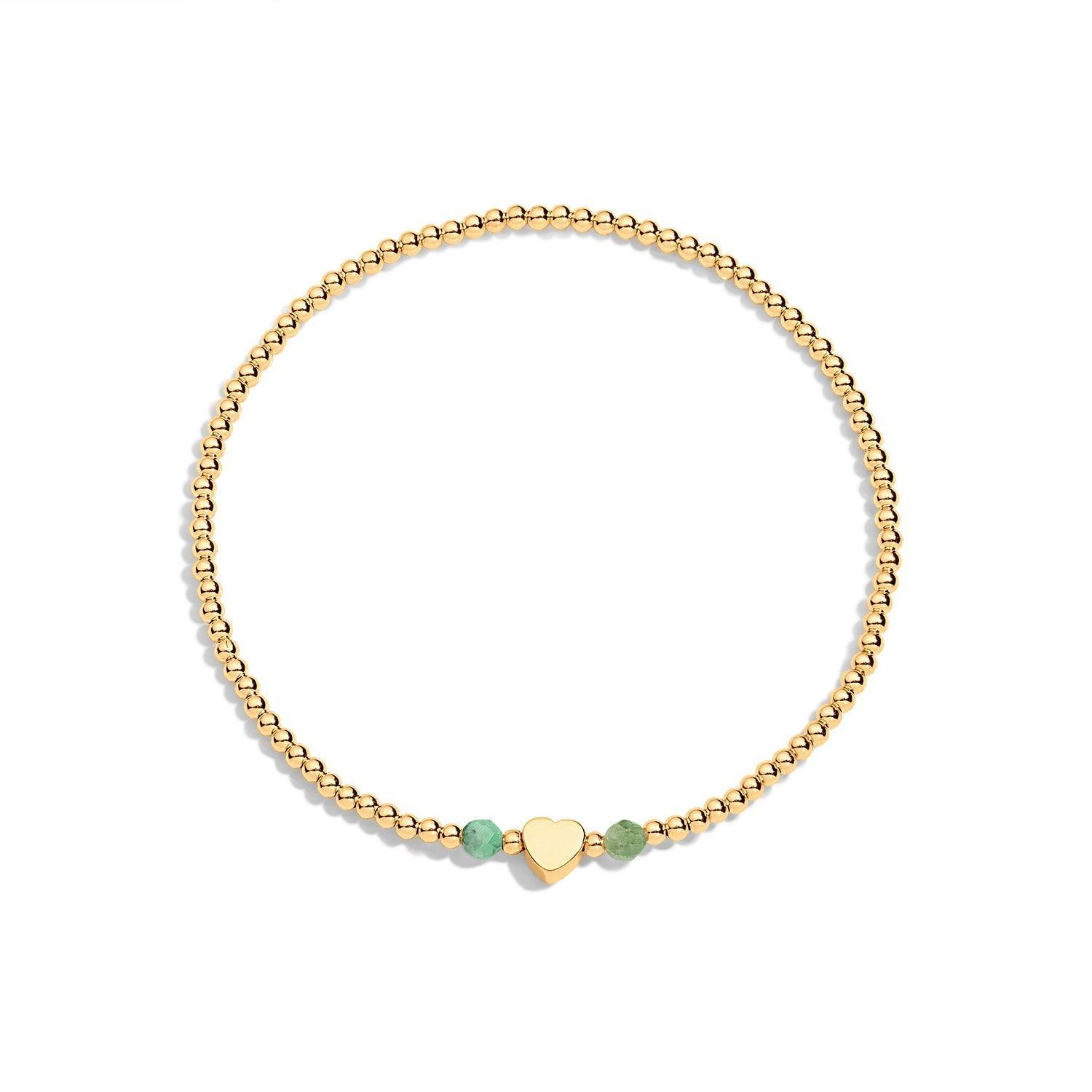 Gold filled bracelet with 2 green gemstones