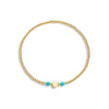 Gold filled bracelet with 2 turquoise gemstones