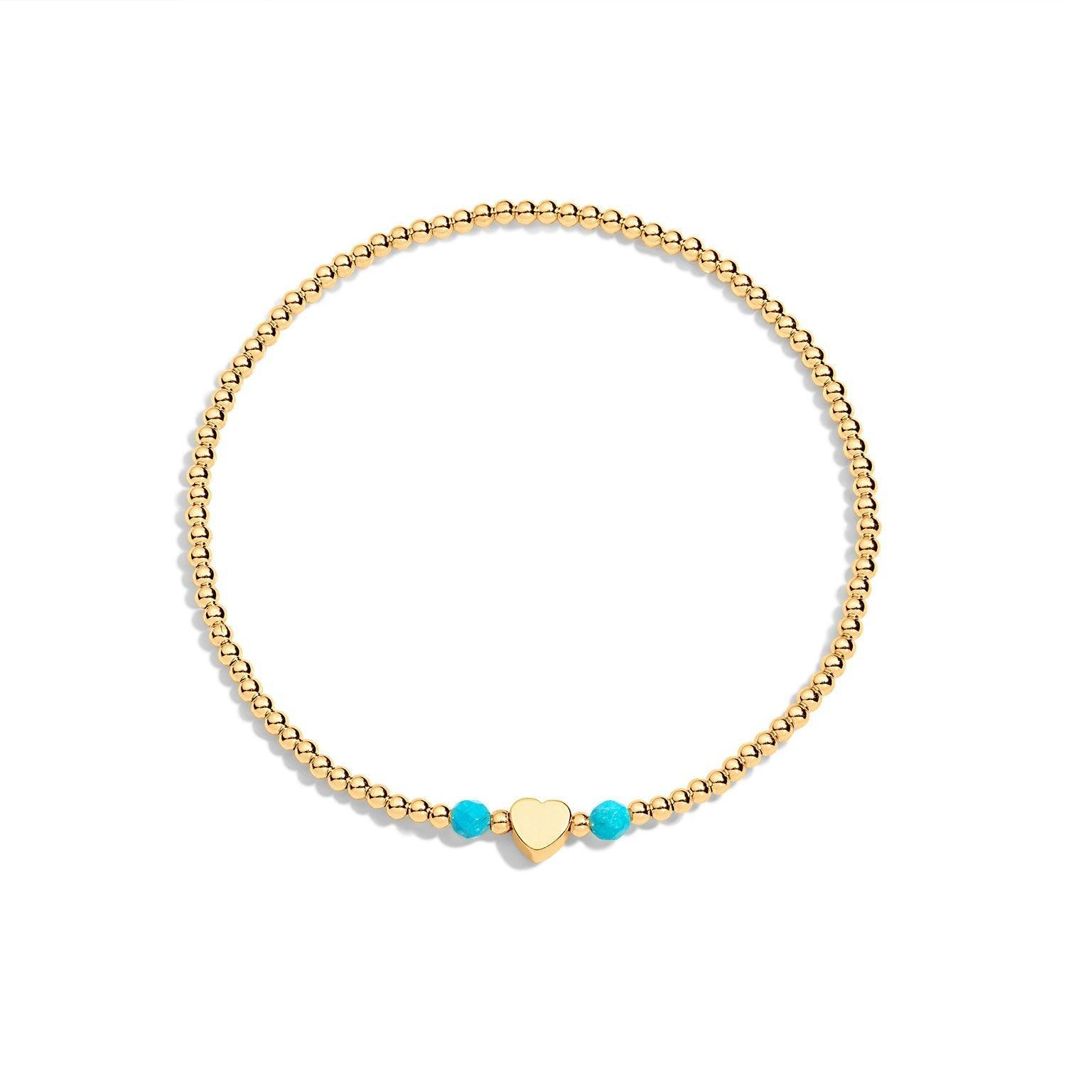 Gold filled bracelet with 2 turquoise gemstones