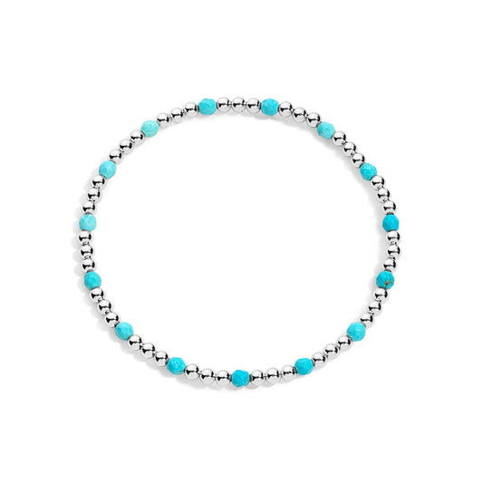 A sterling silver bracelet with turquoise gemstones, featuring a stretch design for flexibility.