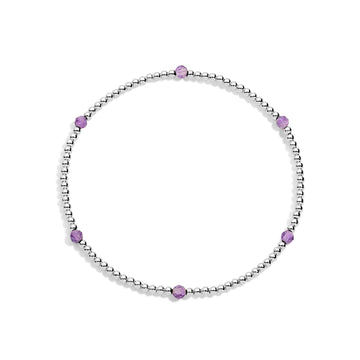 A sterling silver bracelet with purple gemstone accents on a white background.