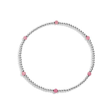 A sterling silver bracelet with pink gemstone accents on a white background.