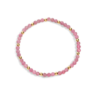 Pink gemstone bracelet with gold-filled accents.