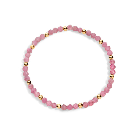 Pink gemstone bracelet with gold-filled accents.