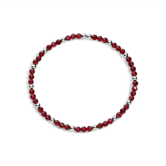 A sterling silver bracelet with garnet gemstone beads and silver accents, displayed against a white background.